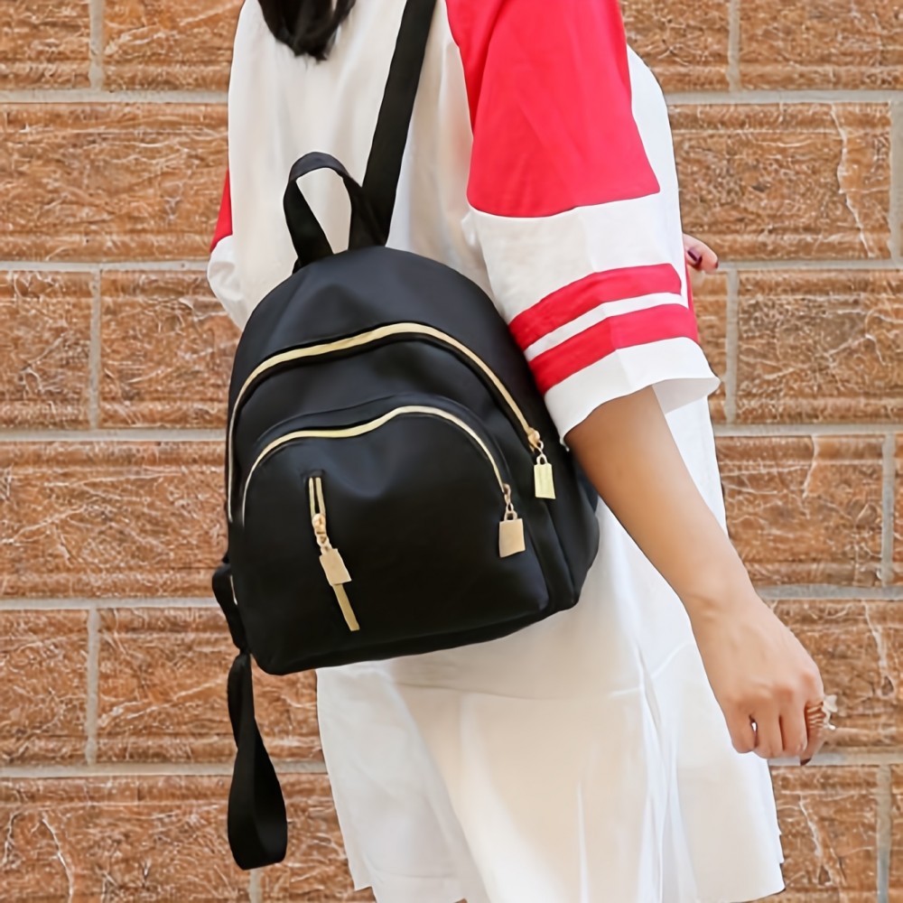 女性用ナイロンバックパック - シックなブラックに黄色いジッパーアクセント、複数のコンパートメント、調節可能なショルダーストラップ、カジュアルなプレッピスタイル、学校、大学、またはカジュアルな使用に適したデイパック、大学バックパック|カジュアルなプレッピスタイル|耐久性のあるバックパック