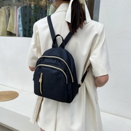 スタイリッシュなナイロン製レディースバックパック - ブラックにゴールドジッパー、複数のコンパートメント、調節可能なショルダーストラップ、日常使いに適した変換デザイン、旅行用バックパック スタイリッシュなナイロン製レディースバックパック - ブラックにゴールドジッパー、複数のコンパートメント、調節可能なショルダーストラップ、日常使いに適した変換デザイン、旅行用バックパック